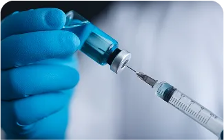 blue-vial-syringe-closeup