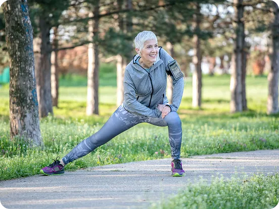 woman-stretching-outdoors woman-doing-side-lunge